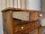 A vintage Biedermeier style richly figured, warm honey-toned veneered burl wood small rectangular side table with three...
