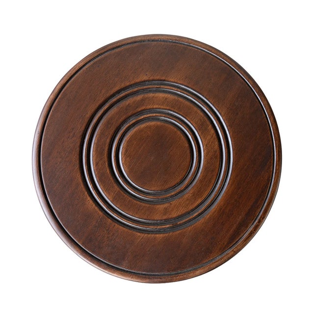 A beautifully turned three-legged stool featuring a bobbin-leg design and rich, warm wood tones. The substantial round...