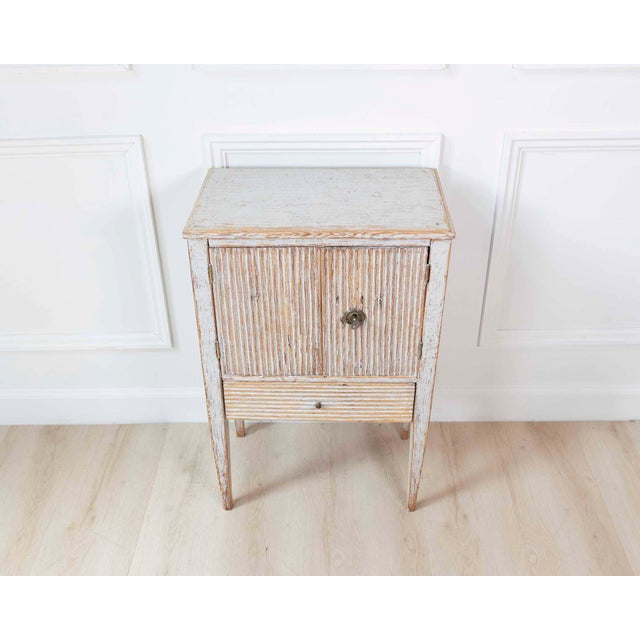 Made in Sweden around 1790, this Gustavian nightstand shows the restrained neoclassical character of the style. The...