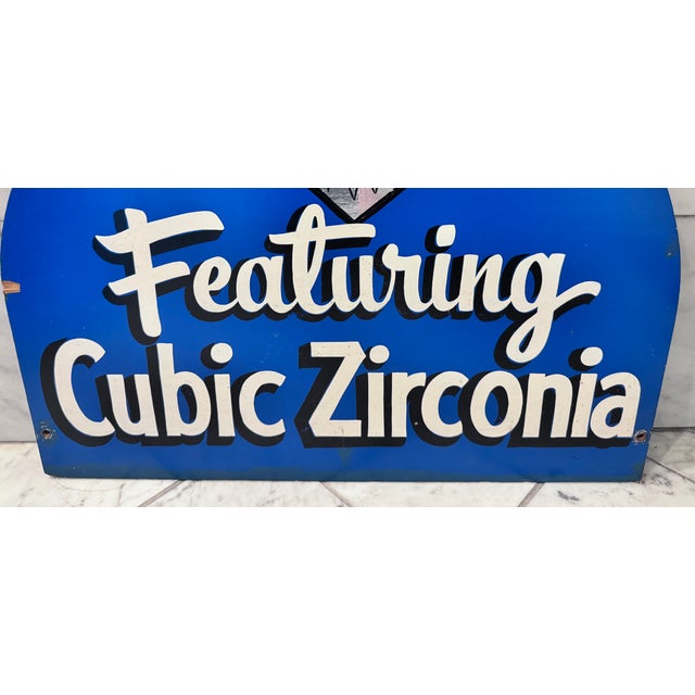 A fun piece that makes the room! This cubic zirconia sign came from a carnival ride and has a mylar like diamond and...