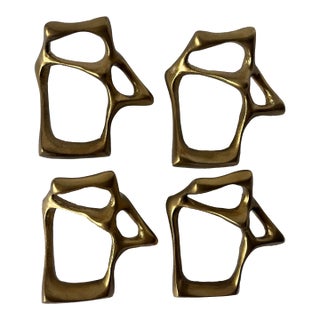 1990s Tom Dixon Modern Brass Sculptural Bone Napkin Rings – Set of 4 For Sale