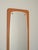 Elongated wall mirror with teak wood frame. Good vintage condition. The glass is partially oxidized. This piece has an...
