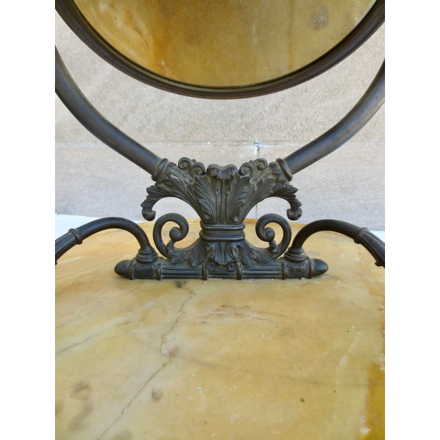 Antique French Empire bronze swan double-sided table mirror. The mirror is a magnifier side and a regular mirror. The...