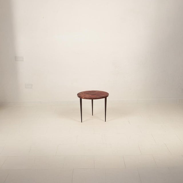 Rare and refined round low table designed by Aldo Tura and produced in Italy during the 1950s, a period of full expressive...