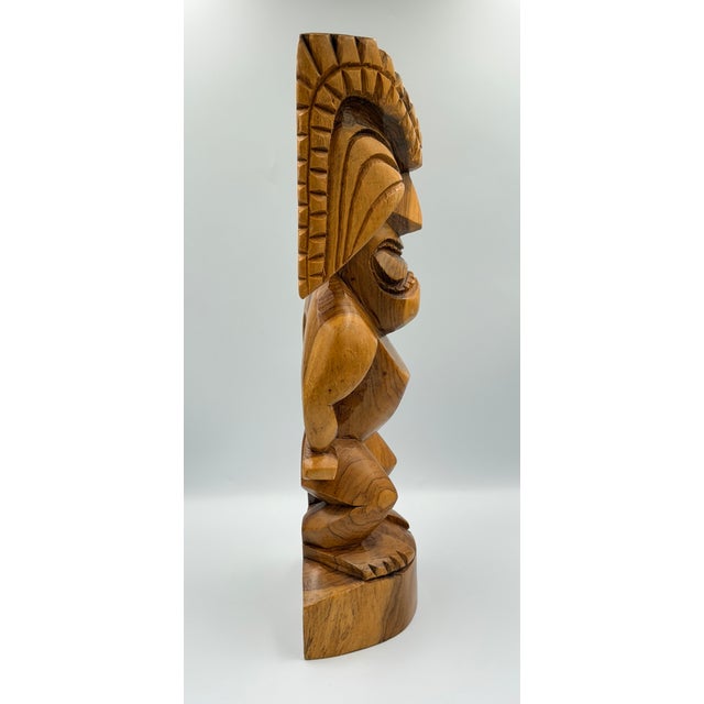 Discover a magnificent piece of Polynesian culture with this vintage hand-carved Tiki Totem, depicting Ku, the revered God...