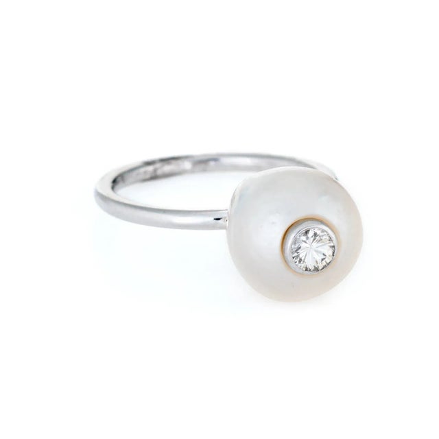 Finely detailed estate cultured pearl & diamond ring, crafted in 14 karat white gold. The cultured pearl measures 10mm...