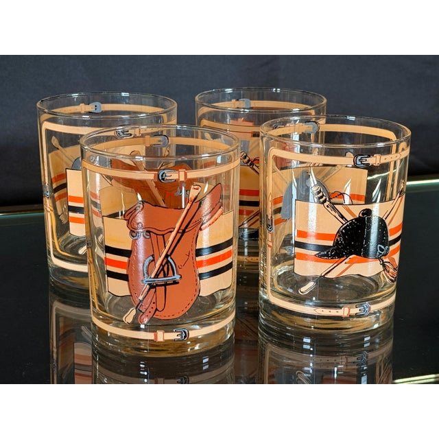 This set of four rocks glasses features a lively equestrian theme with each glass depicting a different piece of polo or...