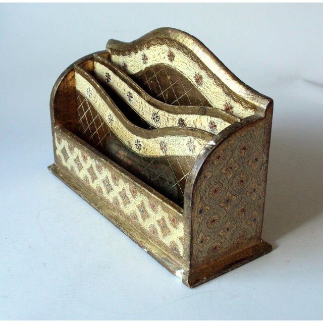 This beautifull old florentine wooden letter holder dates from the 1950s and was made in Florence. As a one-off piece, it...