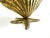 Vintage brass clamshell dish raised on a sculptural starfish base, blending naturalistic coastal form with a glamorous...