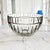A substantial crystal centerpiece bowl attributed to Tiffany & Co., designed in the distinctive Atlas pattern and dating...