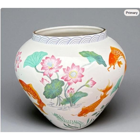 This striking porcelain piece, titled The Vase of the Golden Carp, was designed by artist Zhe Zhou Jiang and issued by The...