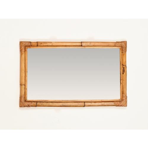 Wonderful Mid-Century organic rectangular mirror with a double frame in bamboo and rattan. This stunning French...