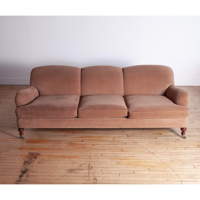 Designed by Ralph Lauren, the "Somerville" sofa features a gracefully arched double back, generous English rolled arms,...