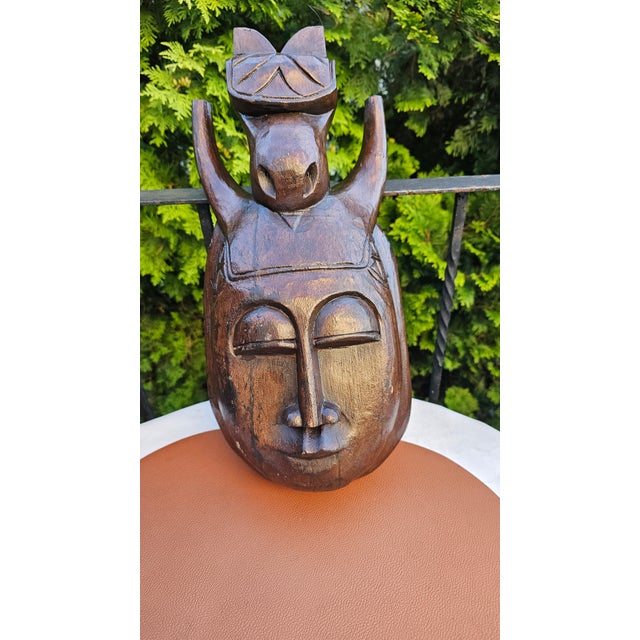 Wooden sculpture, African mask, 1950s–1960s, dimensions: height 46 cm, width 22 cm, depth 10 cm.
