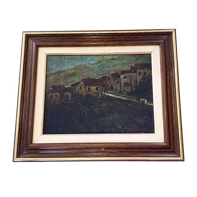 This oil on wood artwork by Brazilian artist Jose Cavaliere portrays a small town featuring houses with red roofs. The...