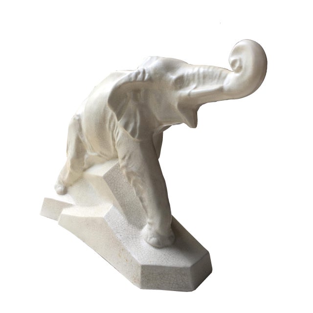 White elephant ceramic handmade from France. Faience work. Art Deco around 1930. Running on a rock. France, Art Deco,...