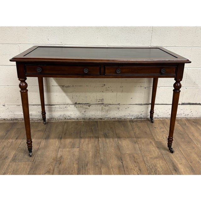 This is a gorgeous vintage Regency Revival Directoire style leather top writing desk, executive desk, or library table....