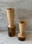 Pair of vintage handcrafted turned wood candle holders made of a light toned wood and natural darker live-edge or bark-...