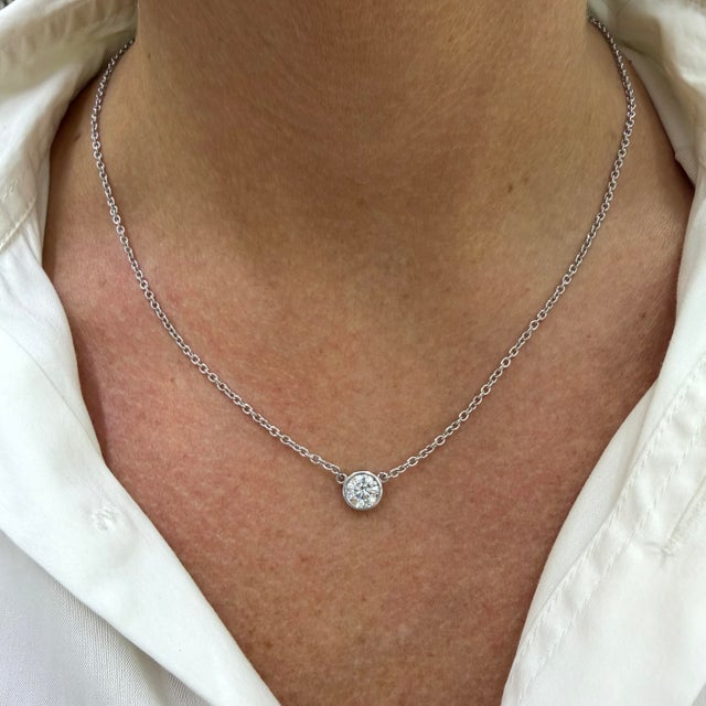 Gender: Ladies Metal Type: 18K White Gold Length: 18.00 inches Width: 2.00 mm Weight: 5.13 grams Lady's rhodium plated 14K...