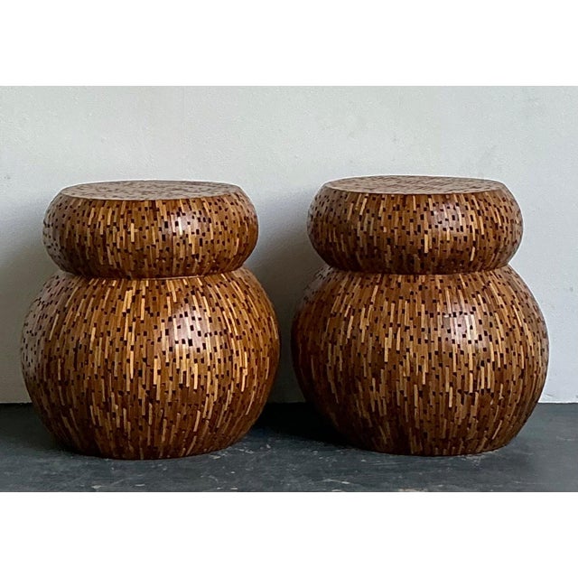 This exceptional pair of vintage wood mosaic low stools showcases masterful craftsmanship and a sculptural sensibility...