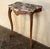 19th Century French Louis XV Walnut Marble Top Console features timeless elegance with its definitive naturalistic form...