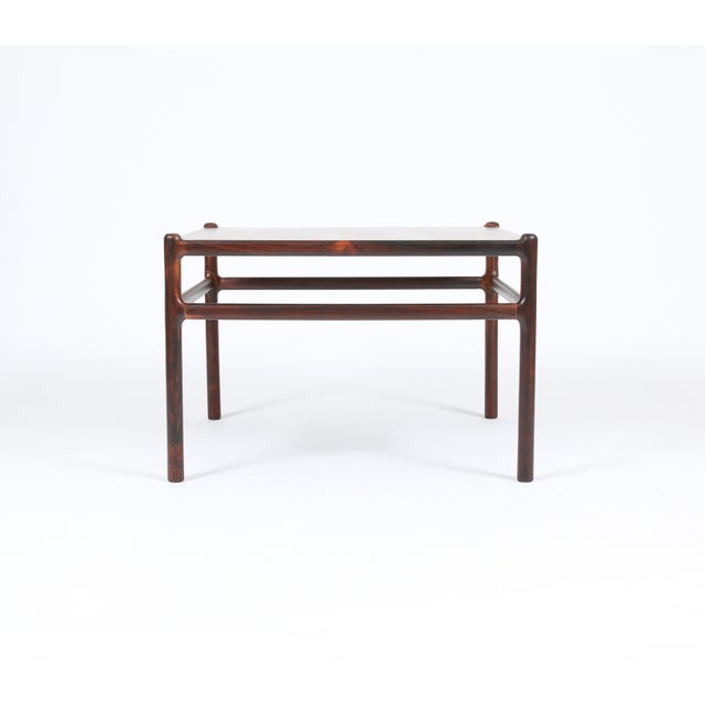 Here is a vintage Danish rosewood coffee or corner table by C.F. Christensen (aka CFC Silkeborg), circa 1960s. This table...