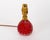 A scarce pair of small wrythen drop-shaped sommerso glass table lamps, with a core of ruby red, a layer of controlled...