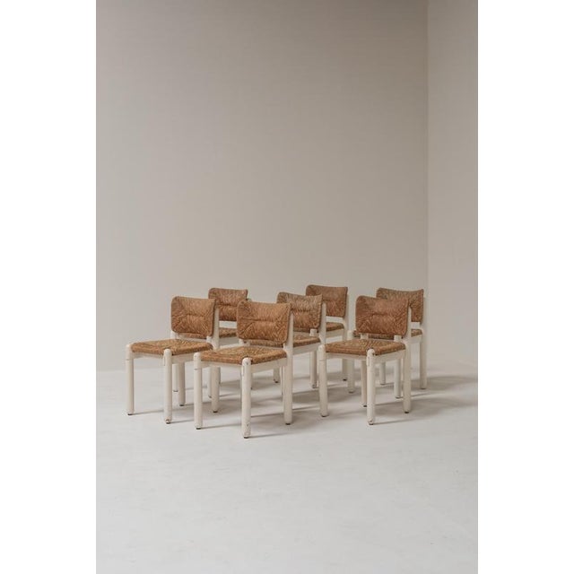 A rare set of seven Baba dining chairs designed by Assostudio for Pozzi & Verga in the 1980s. Characterized by their...