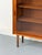 High-quality teak highboard with two smooth-running, glazed sliding doors. Inside, each door has three adjustable shelves....
