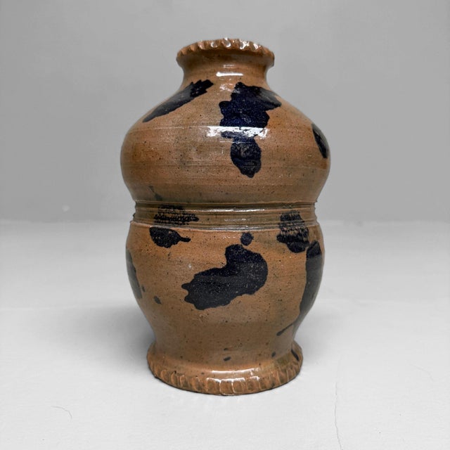 A distinctive vase with a soft, rounded form and carefully observed details. Dimensions: height 20 cm, diameter...