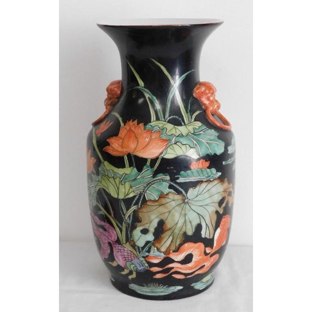 Vintage Mid-Century Chinese Famille Noire Baluster Vase Hand Painted Lotus and Koi Fish 14 Inch This striking Mid-Century...