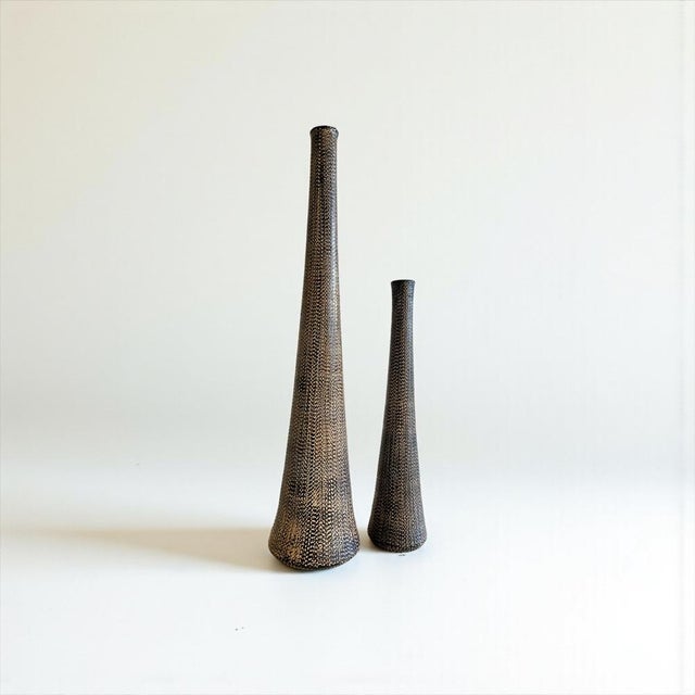 We are offering a very rare pair of vases from gunter lambert, a renowned manufacturer of high-quality furniture,...