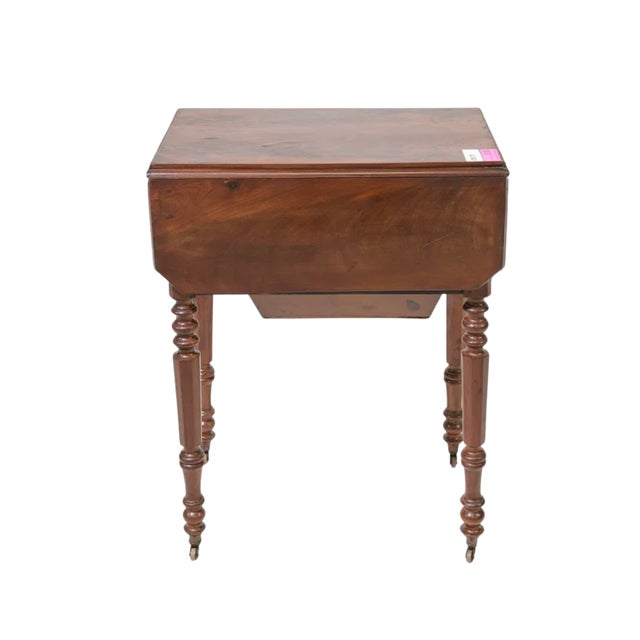 One of those pieces that makes modern furniture feel a little lazy. This antique French mahogany sewing table was designed...