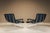 Lightness defines this pair of du 57 sofas by mario rinaldi for mim roma. New dark blue upholstery meets an ivory-coloured...