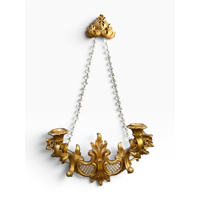 Absolutely fabulous vintage HOMCO 4002T wall sconce featuring an elaborate gilded, Rococo-inspired design of scrolling...