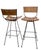 Pair of Mid Century swivel bar stools, designed by Arthur Umanoff, for Raymor c. 1960's. The stools are constructed of...