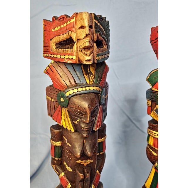 Remarkable Unique and Intricate Pair of Hand Carved and Hand Painted Mayan Aztec Totem Sculptures. Beautifully carved wood...