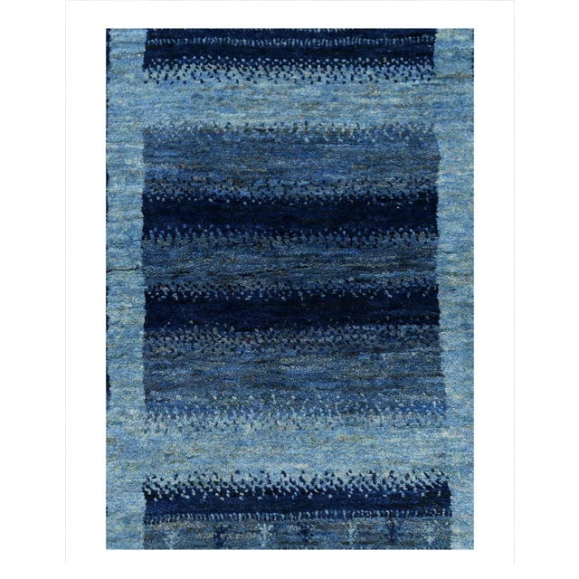 The word Gabbeh translates closely to unfinished or unclipped. Originally these rugs were woven for the weavers use with...