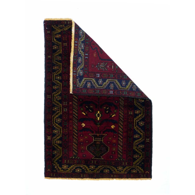 Vintage Afgan Balouch Rug 3’0" x 4’8". Interesting prayer scatter with n all red ground displaying striped lateral columns...