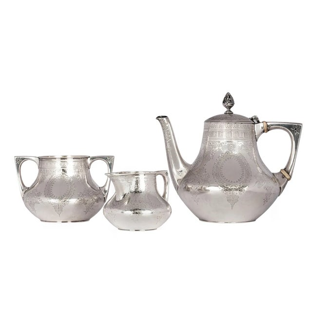 A fine antique sterling silver Aesthetic Movement tea service, by Walter & John Barnard, London 1878. This very fine...