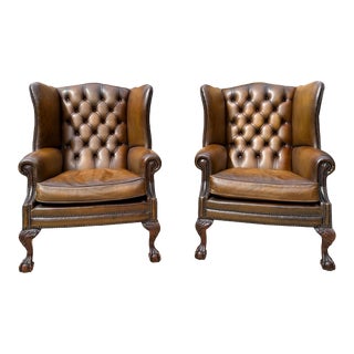 Pair of Leather Wing Back Tufted Chairs on Ball & Claw Feet, English, Ca. 1920. For Sale