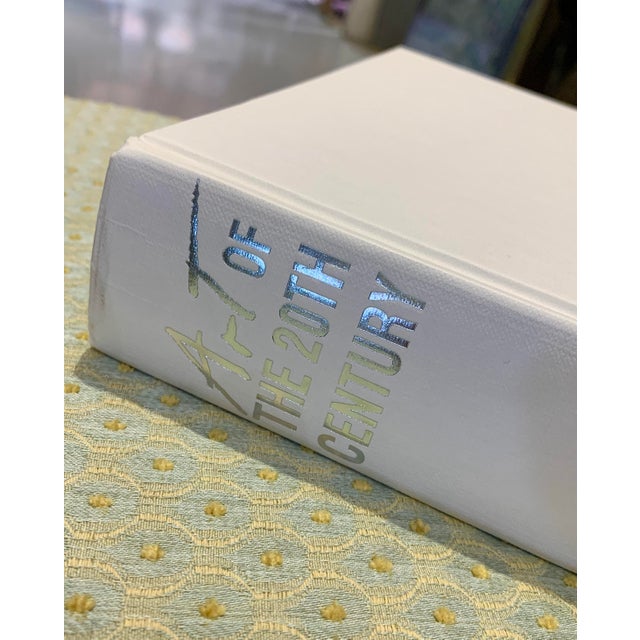 Striking 1980’s coffee table book. “Art Of The 20th Century”. White linen cover with silver lettering. Great for coffee...