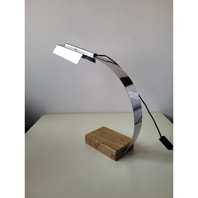 Beautiful table lamp with chromed aluminum structure and marble base, attributed to Tronconi, Italy, 1980s. This piece is...