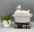 Lovely and elegant white duck tureen with ladle. Mid-late 20th century piece. Perfect for serving your favorite soup. Add...