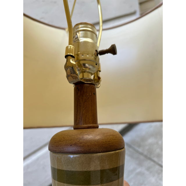 Vintage colorful striped ceramic lamps with beautiful tones and details. Wooden base. Included lamp shades. Purchased at...