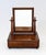 An elegant Georgian mahogany dressing mirror with fine contrasting inlaid stringing The rectangular mirror sits between...
