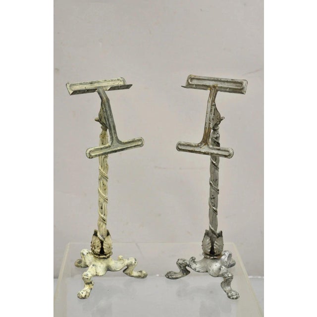 Antique Victorian Cast Iron Tripod Paw Feet General Store Retail Display - Pair. Item features pivoting easel, distressed...