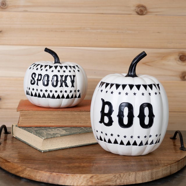 Give your Halloween decor a modern twist with this set of 2 Spooky and Boo Pumpkins! Designed in sleek white and black,...