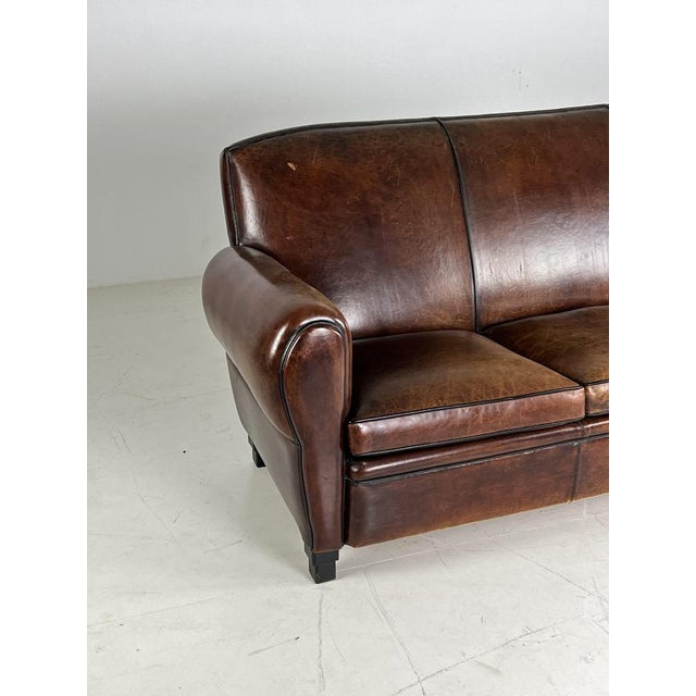 Schaapsleen 3 sitting bank / sofa. Beautiful in color with cool patina. Overall a bit lived. Some places on the top of the...