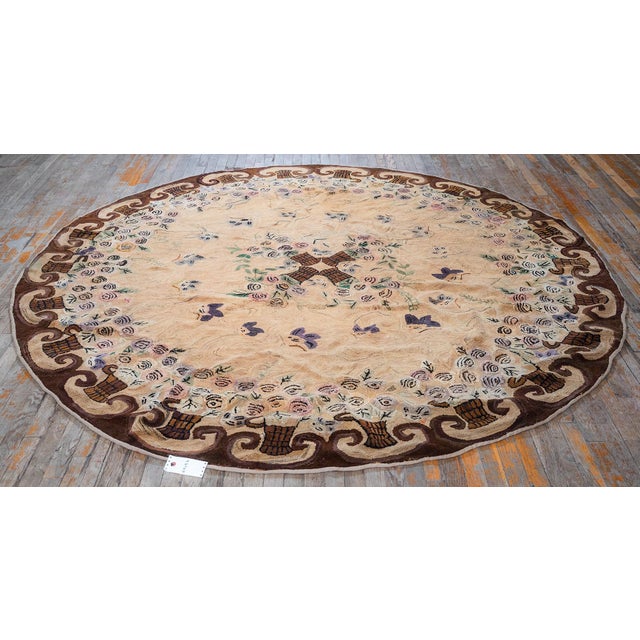 Circa 1880, this Antique American Hooked Rug is a 19th-century folk art piece featuring a yellow ground and brown border....